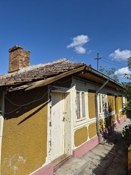 Casă cu 4 camere în Perișoru