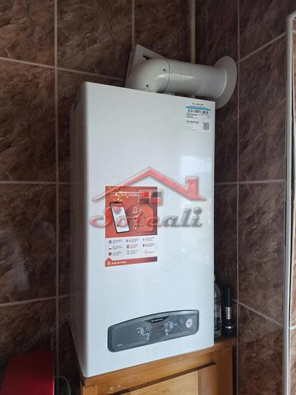 Apartament cu 3 camere decomandat în Cuza