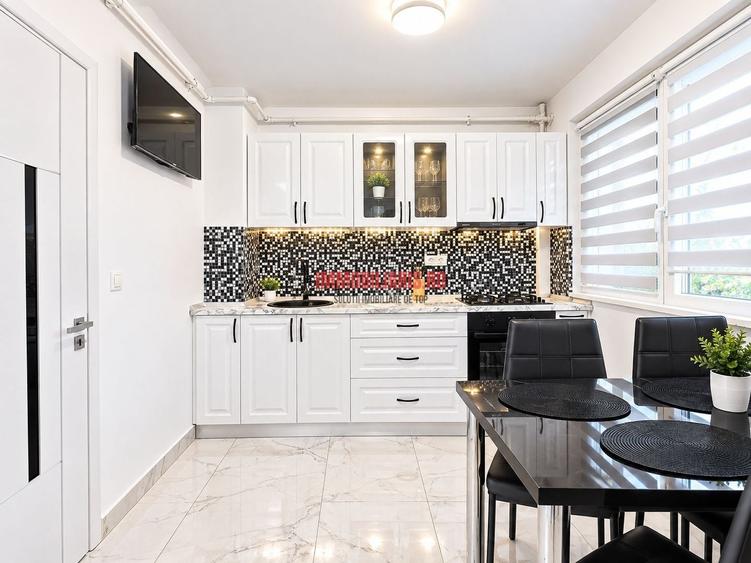 Apartament cu 3 camere semidecomandat, mobilat în Basarabia