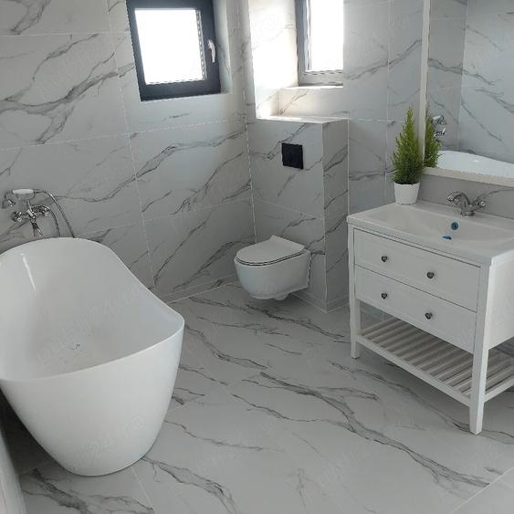 Casă cu Teren 301 Mp în Est