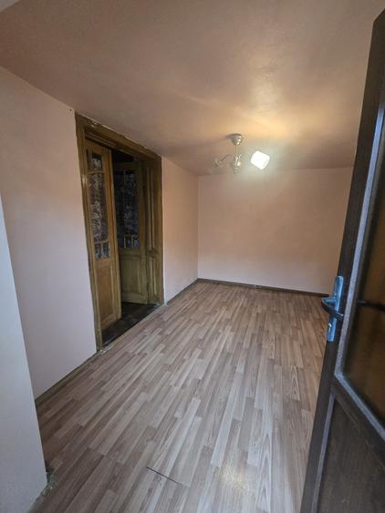 Casă cu 4 camere cu Teren 1000 Mp în Ciclova Română