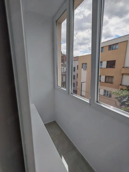 Apartament cu 3 camere semidecomandat în Gară