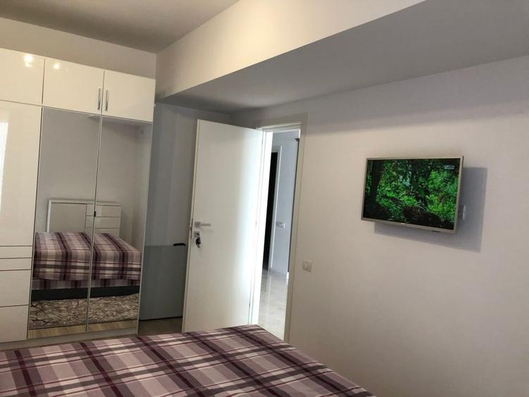 Apartament cu 2 camere semidecomandat, mobilat în Central