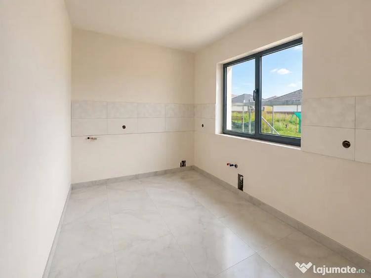 Casă cu 4 camere cu Teren 500 Mp în Sânpetru