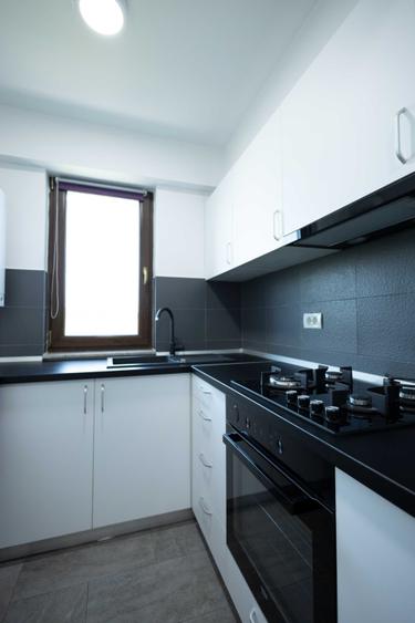 Casă cu 2 camere decomandat cu Teren 58 Mp în Băneasa