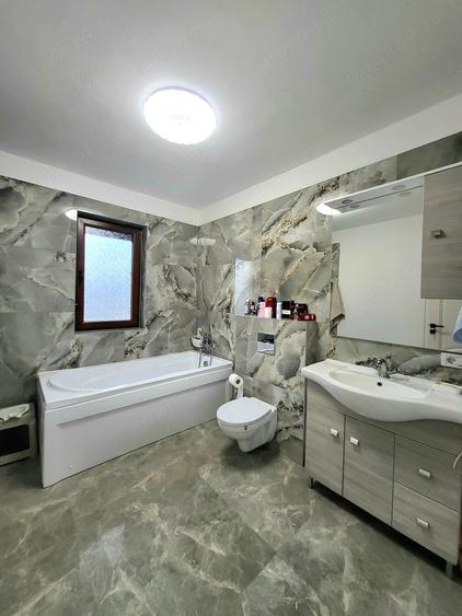 Casă cu Teren 430 Mp în Plopi