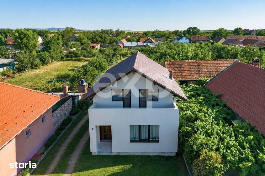 Casă cu 4 camere cu Teren 919 Mp în Racovița