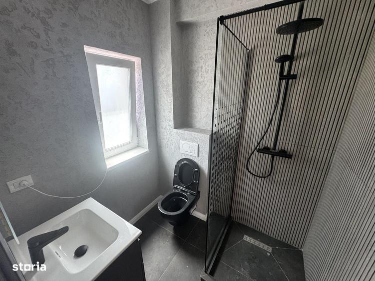 Casă cu 4 camere în Bucium