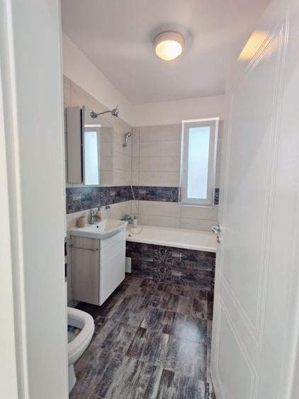Apartament cu 3 camere semidecomandat, mobilat în Giroc