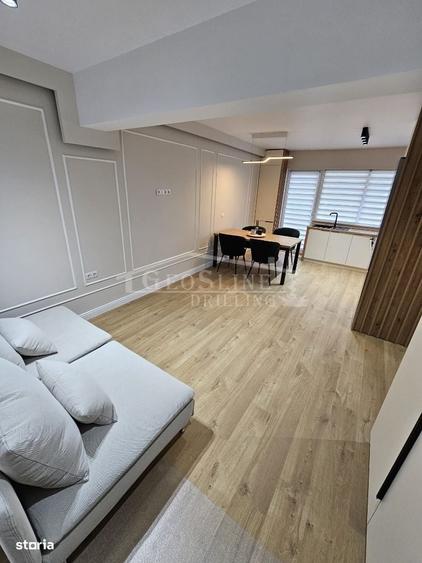 Apartament cu 3 camere decomandat în Sud