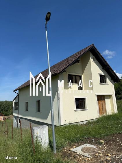 Casă individuală cu 4 camere cu Canalizare în Slimnic