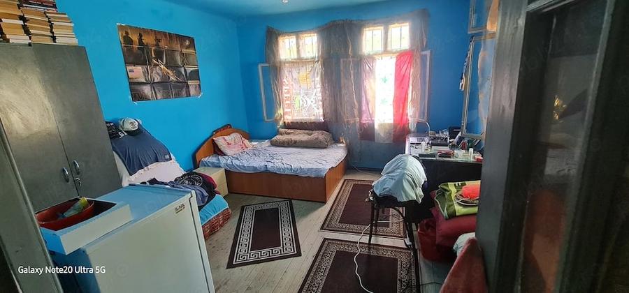 Casă cu Teren 1600 Mp în Melinești