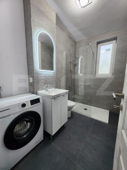 Apartament cu 3 camere semidecomandat în Chinteni
