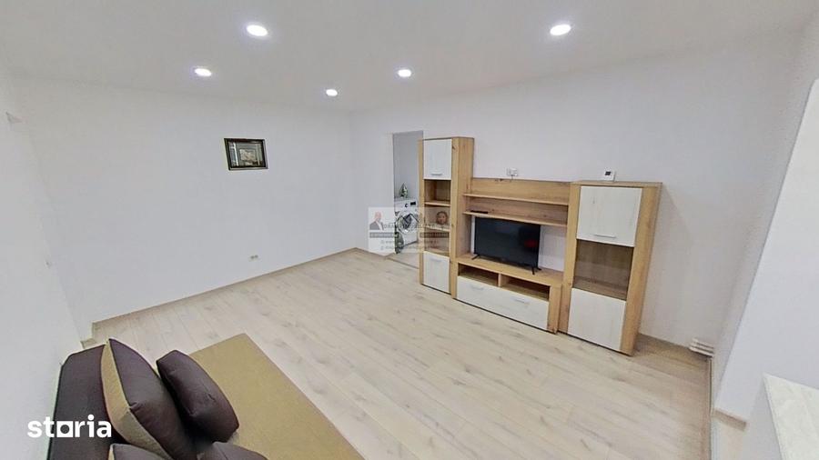 Apartament cu 2 camere semidecomandat, mobilat în Central