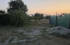 Vand teren intravilan de 1730 mp si casa intabulata la Dinias
