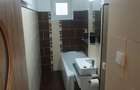 Navodari-bloc apartamente-garsoniera decomandata, parter - 4