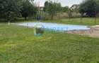 Casa deosebita cu piscina si teren generos