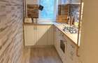 Apartament cu 3 camere semidecomandat în Central - 1