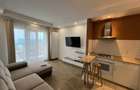 Apartament de inchiriat cu doua camere cu vedere la piscina in Cosmopolis - 5