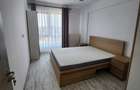 Apartament cu 2 camere decomandat în Haliu - 2