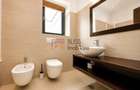 Apartament Elegant cu 4 Camere și Loc de Parcare - 13
