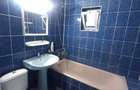 Apartament 3 camere, decomandat, Strada Savinesti, Etaj 1, Tg Jiu - 1