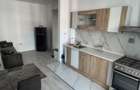 Studio 1 dormitor si living cu bucatarie + parcare 1 loc