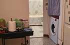 Apartament cu 2 camere decomandat în Uiești - 4