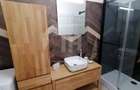 Apartament cu 3 camere semidecomandat în Central - 11