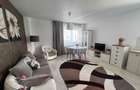 Apartament cu 3 camere decomandat în Tractorul - 1