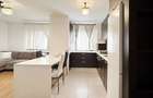 Apartament cu 2 camere decomandat în Tractorul - 4