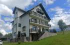 Casă individuală cu 11 camere cu Teren 1300 Mp în Bran - 1