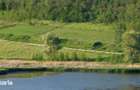 Teren de exceptie 100 m deschidere cu vedere catre lac .