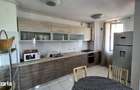 Apartament cu 2 camere 85 mp + 35 mp terasa si balconul + 2 locuri de - 4