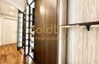 Apartament cu 4 camere decomandat în Capitale - 76