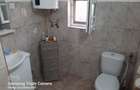 vand casa cu 3 camere , baie , bucatarie , suprafata totala 38 arii , intravilan - 2