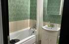Apartament cu 3 camere semidecomandat în Central - 9