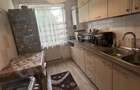 Apartament cu 3 camere decomandat în Tractorul - 2