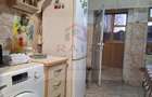 Casă tip triplex 2 camere de vânzare Curtea de Argeș Central / Spațiu Birouri - 10