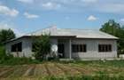 Casa din boltari, acoperita cu tabla, vizavi de gara - 4