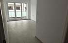 Apartament cu 4 camere decomandat în Tractorul - 4