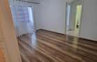 Apartament 2 camere nemobilat- de inchiriat zona Malu Rosu