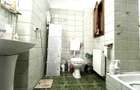 Casa individuala, 6 camere, 3 bai, garaj,acces auto, teren de 411