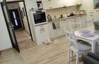 Apartament cu 3 camere semidecomandat în Bucium - 2