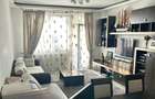 Apartament cu 2 camere decomandat în Tractorul - 1