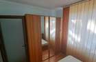 Apartament cu 3 camere decomandat în Roman - 11