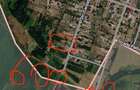 2 hectare ( 2 parcele fiecare cate 1 hectar ) + 600 mp intravilan - 1