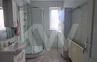 Apartament modern cu 2 camere, curte privată și 2 locuri de parcare