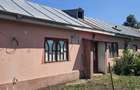 Casă cu 4 camere cu Teren 1200 Mp în Central