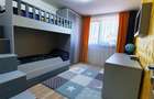 Apartament cu 4 camere decomandat în Tractorul - 33